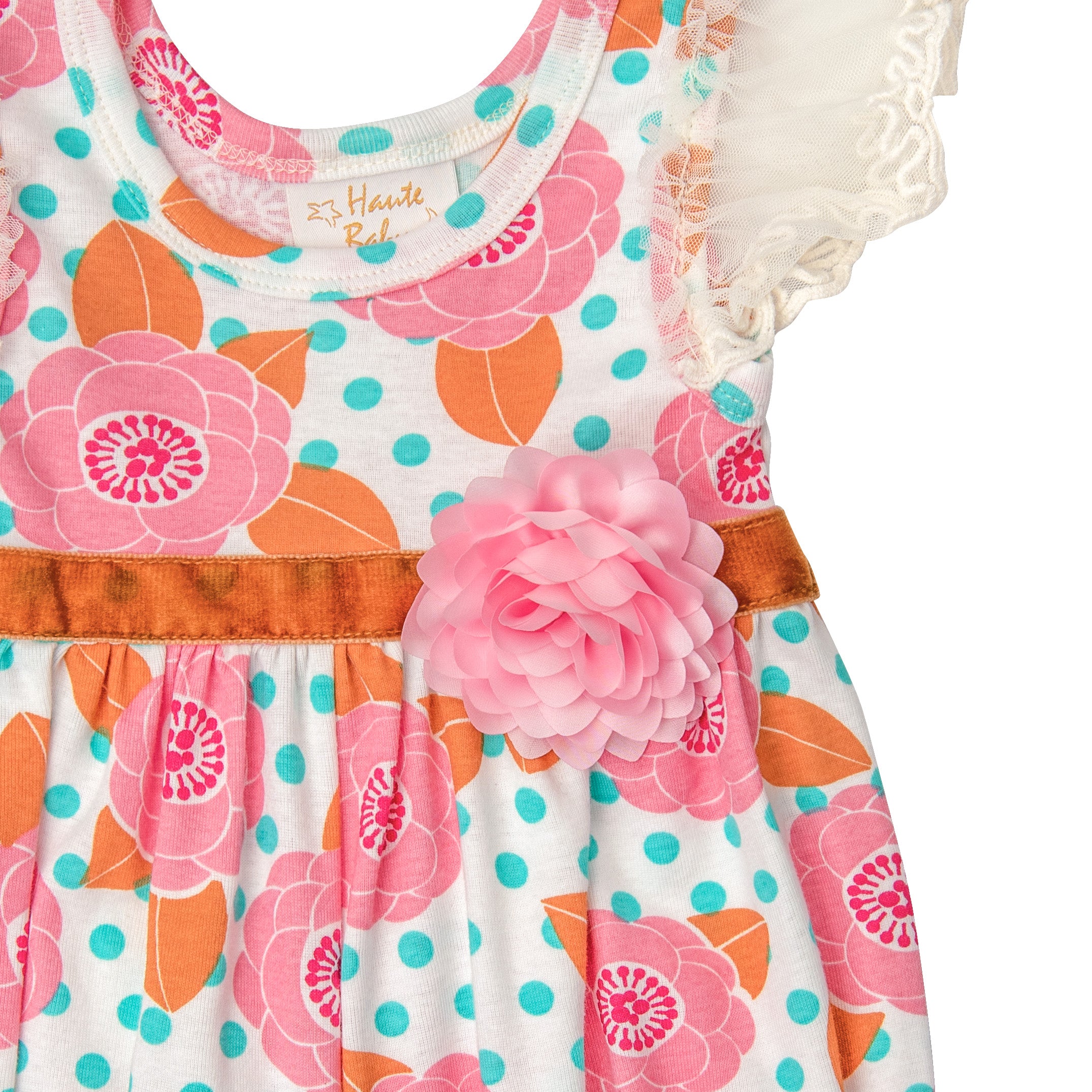 Cloe's Baby Romper featuring a vibrant floral bouquet design, perfect for spring outings.