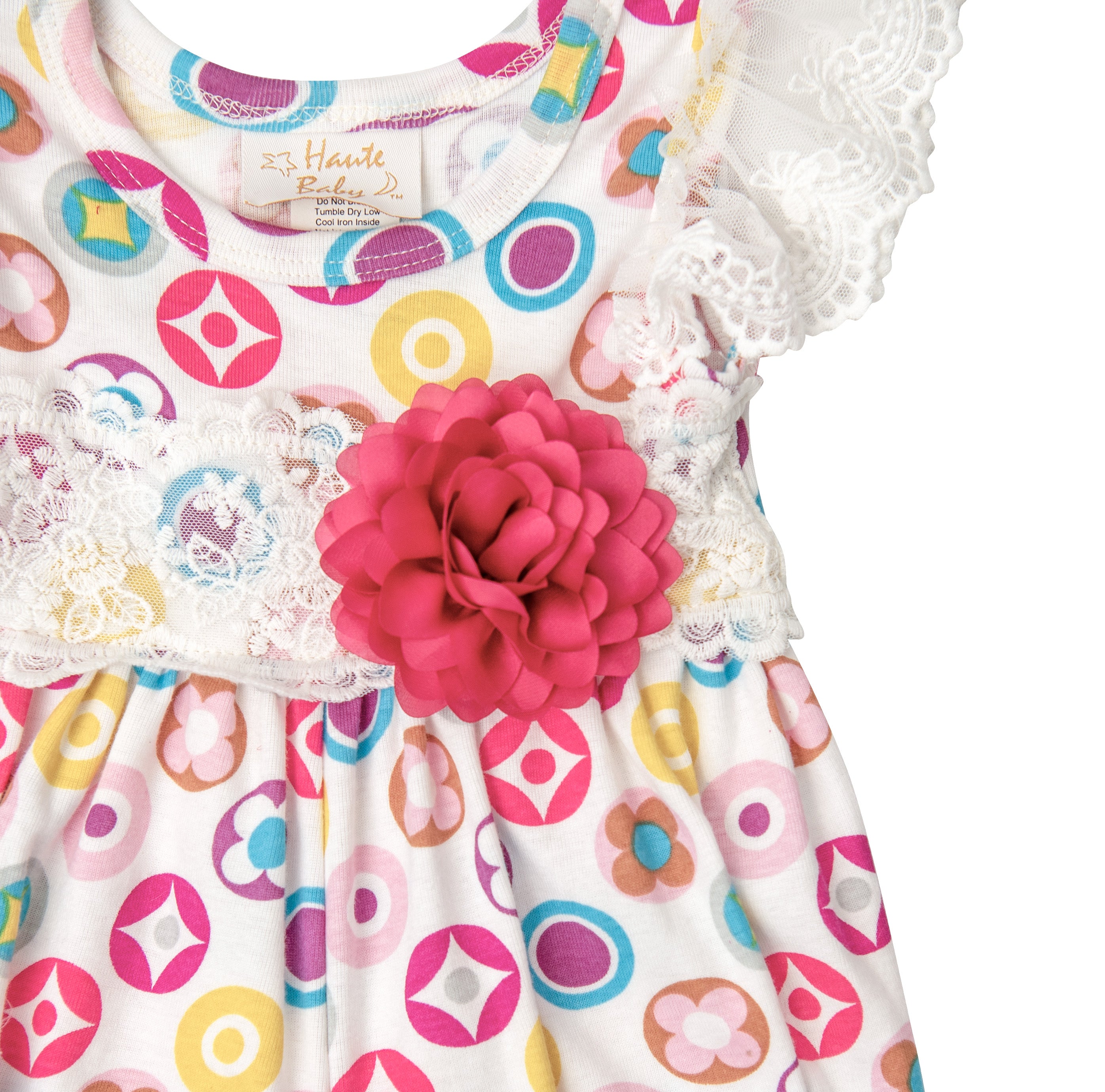 A soft pink baby romper designed for spring, featuring a comfortable fit and adorable style for infants.