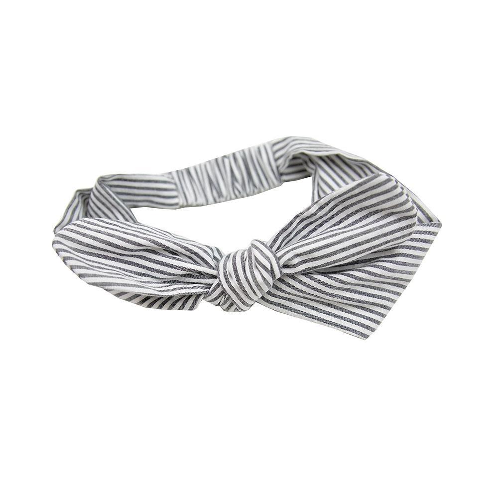 A stylish Summer Time Matching Lucy Bow in vibrant colors, perfect for summer outfits.