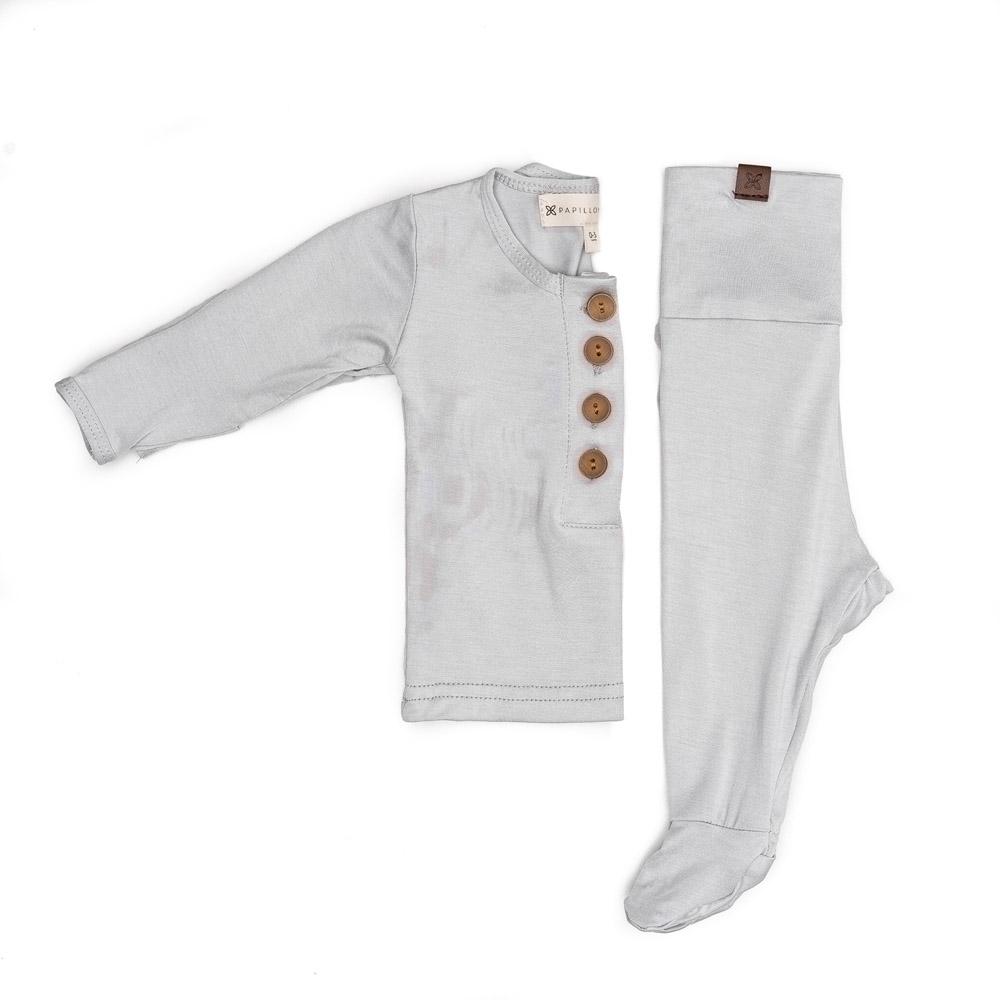 A cute baby outfit set featuring a soft fabric blend with functional wooden buttons, designed for comfort and style for infants.