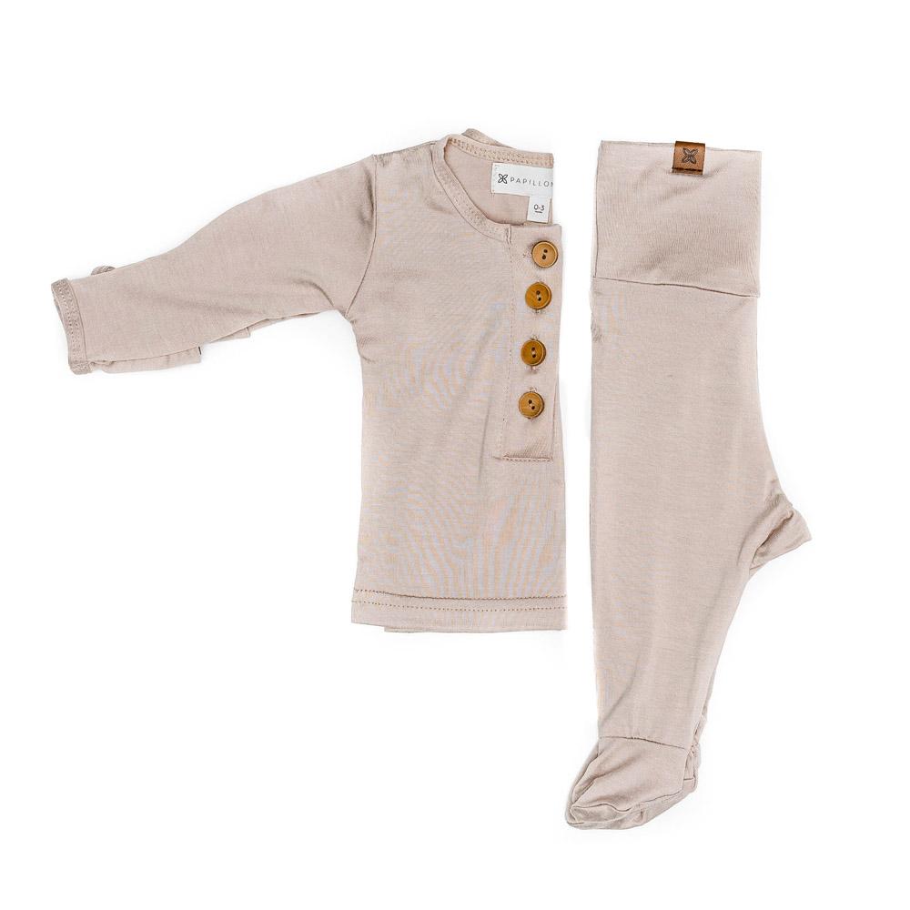 A cute baby outfit set featuring a soft fabric blend with functional wooden buttons, designed for comfort and style for infants.