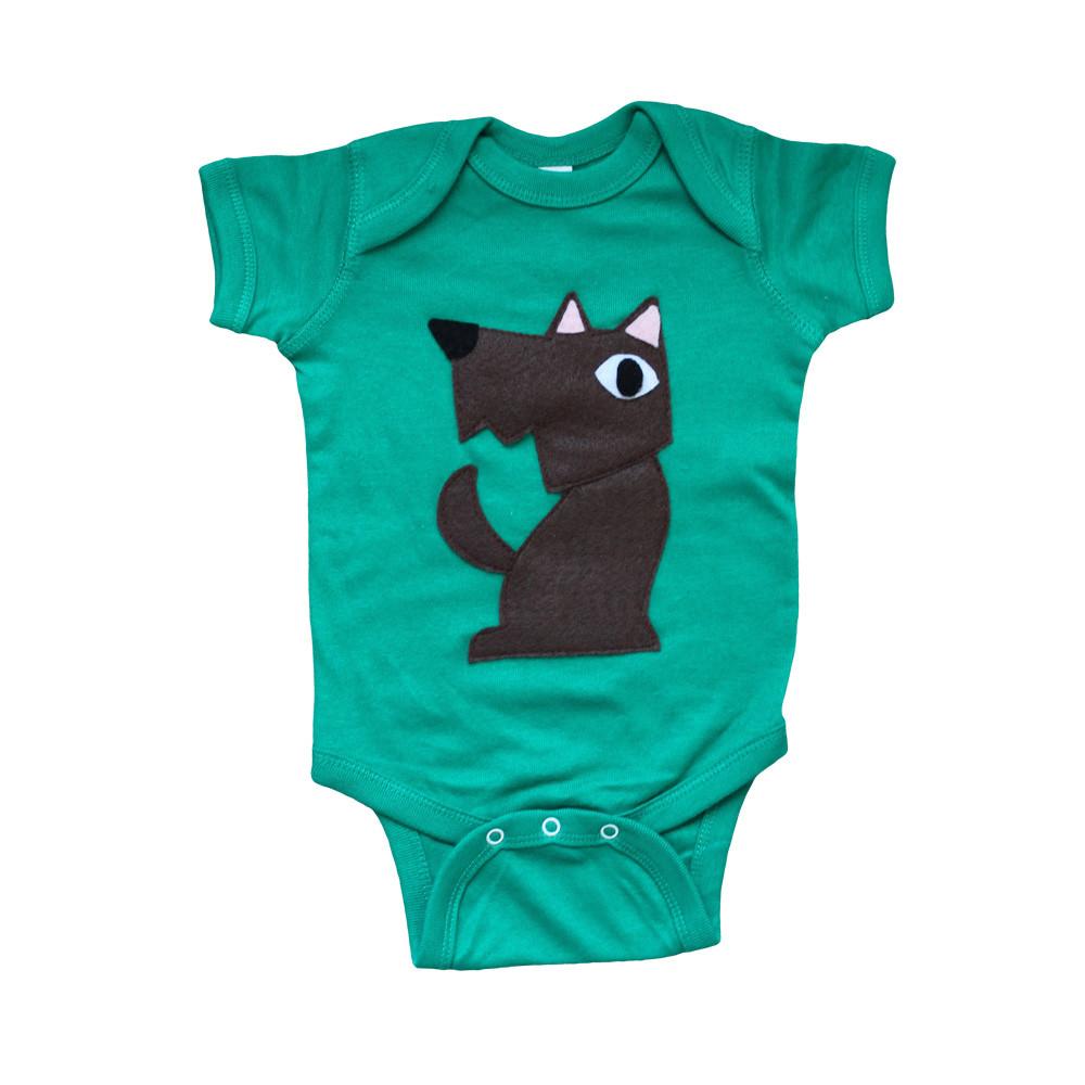 Adorable baby onesie featuring Toto the Dog from The Wizard of Oz, handmade with eco-friendly materials and colorful appliqué design.