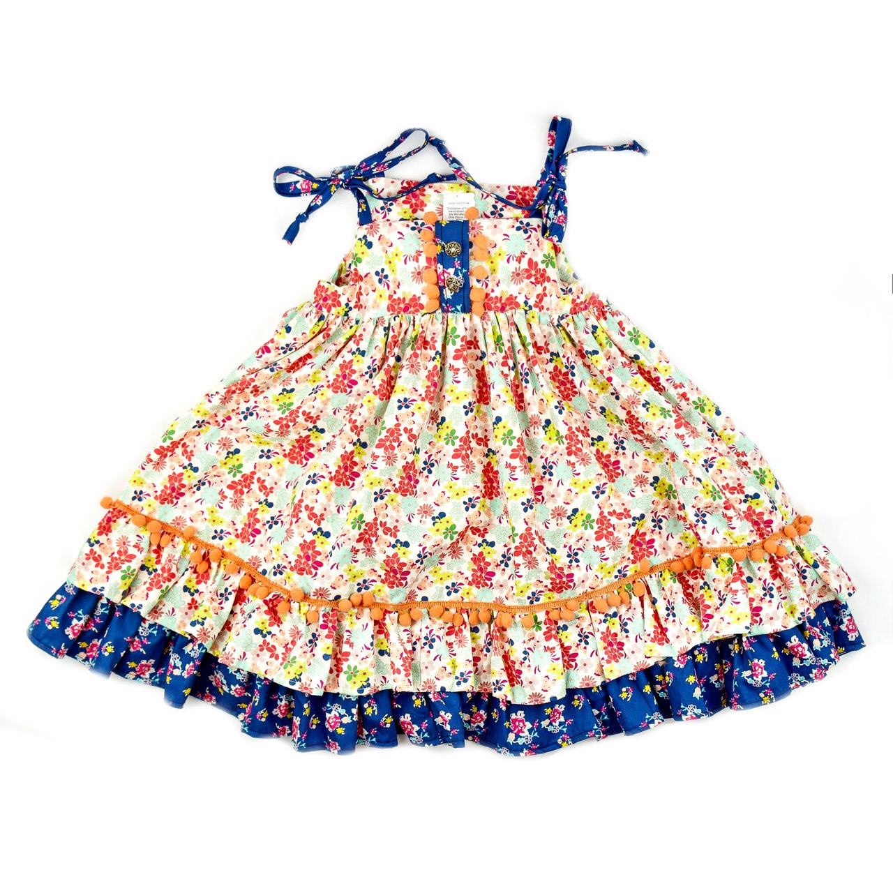 A colorful tropical dress for girls featuring vibrant floral patterns, perfect for summer outings.