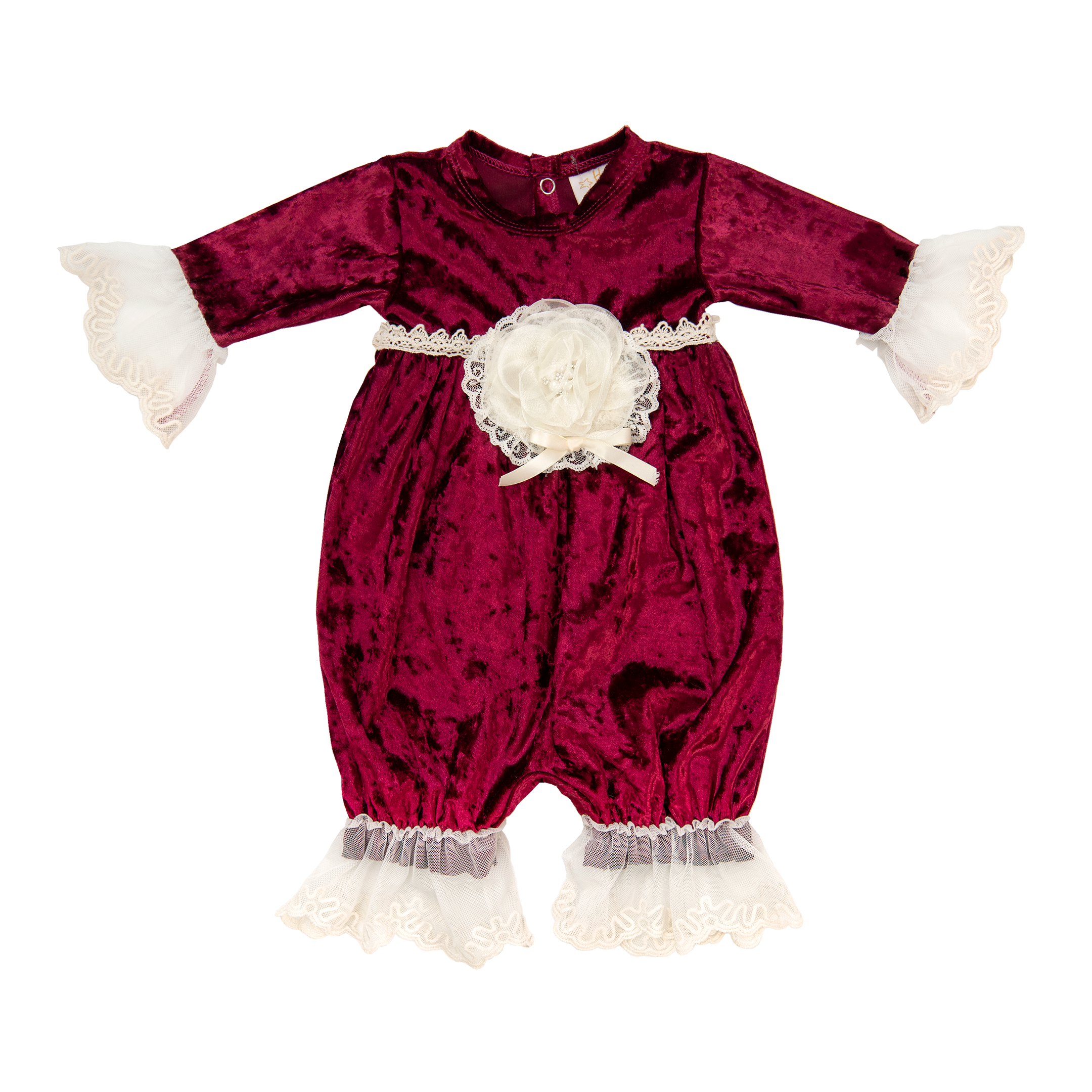 A luxurious Victoria Romper made of crushed velvet with delicate lace and trims, perfect for a baby's first holiday picture.