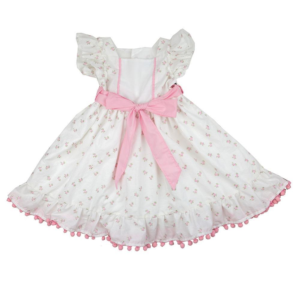 A vintage-inspired little girls dress featuring soft fabric, delicate patterns, and a charming design suitable for various occasions.