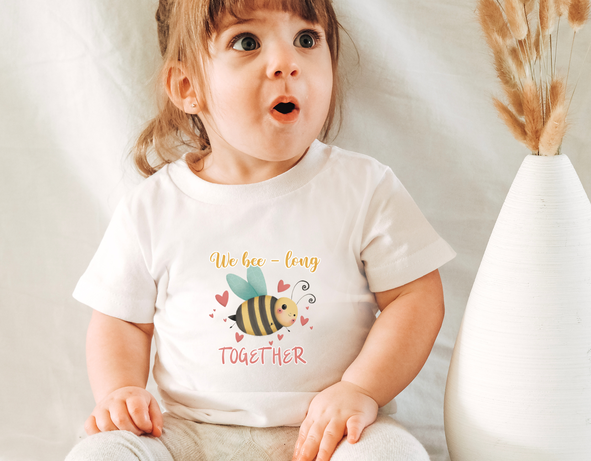 We Bee Long Together Toddler Shirt featuring a cute bee design, perfect for Valentine's Day, made from high-quality CPSIA compliant materials.