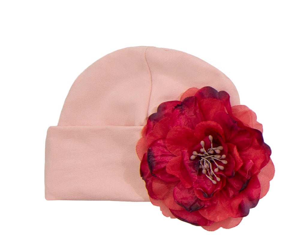 A vibrant Wild Bloom Cap featuring a colorful floral pattern, perfect for stylish babies.