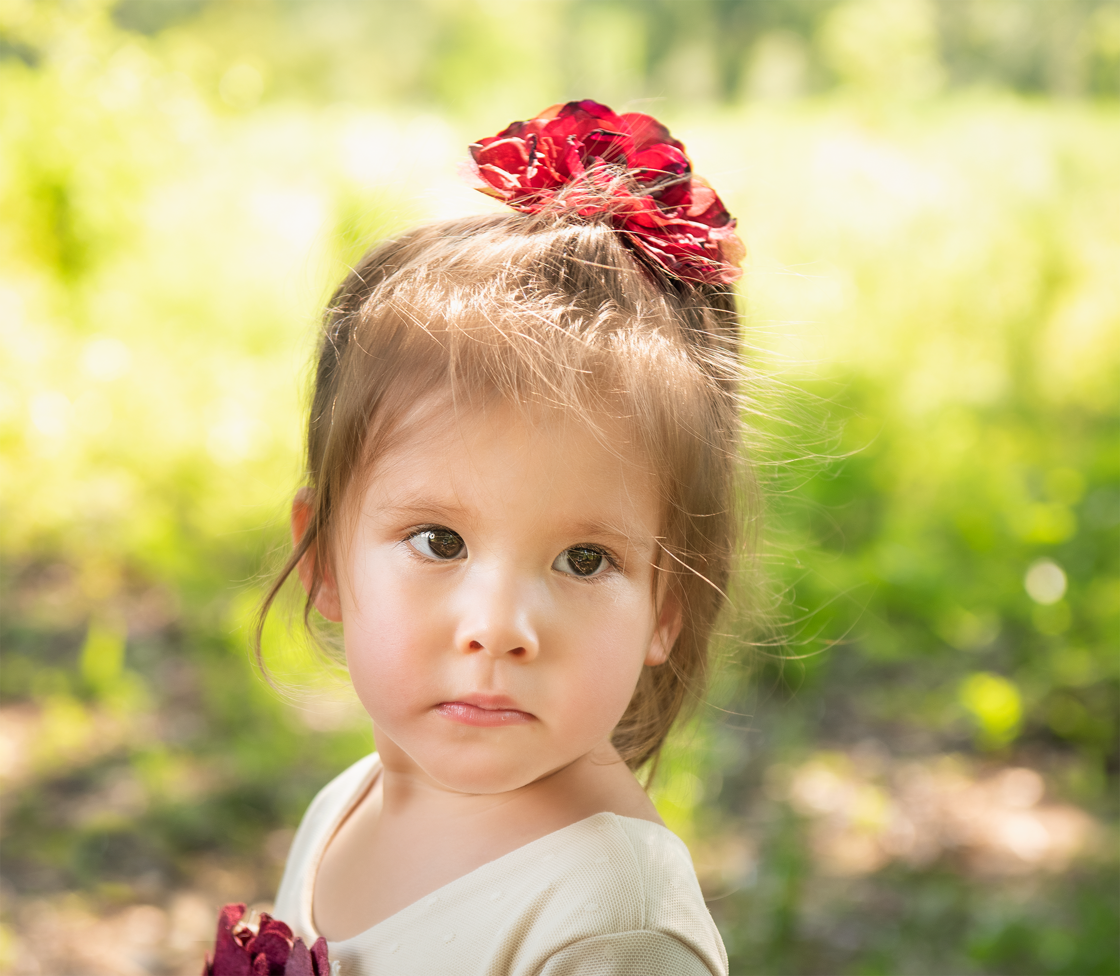 A colorful Wild Bloom Clippie featuring a vibrant floral pattern, perfect for stylish hairdos.