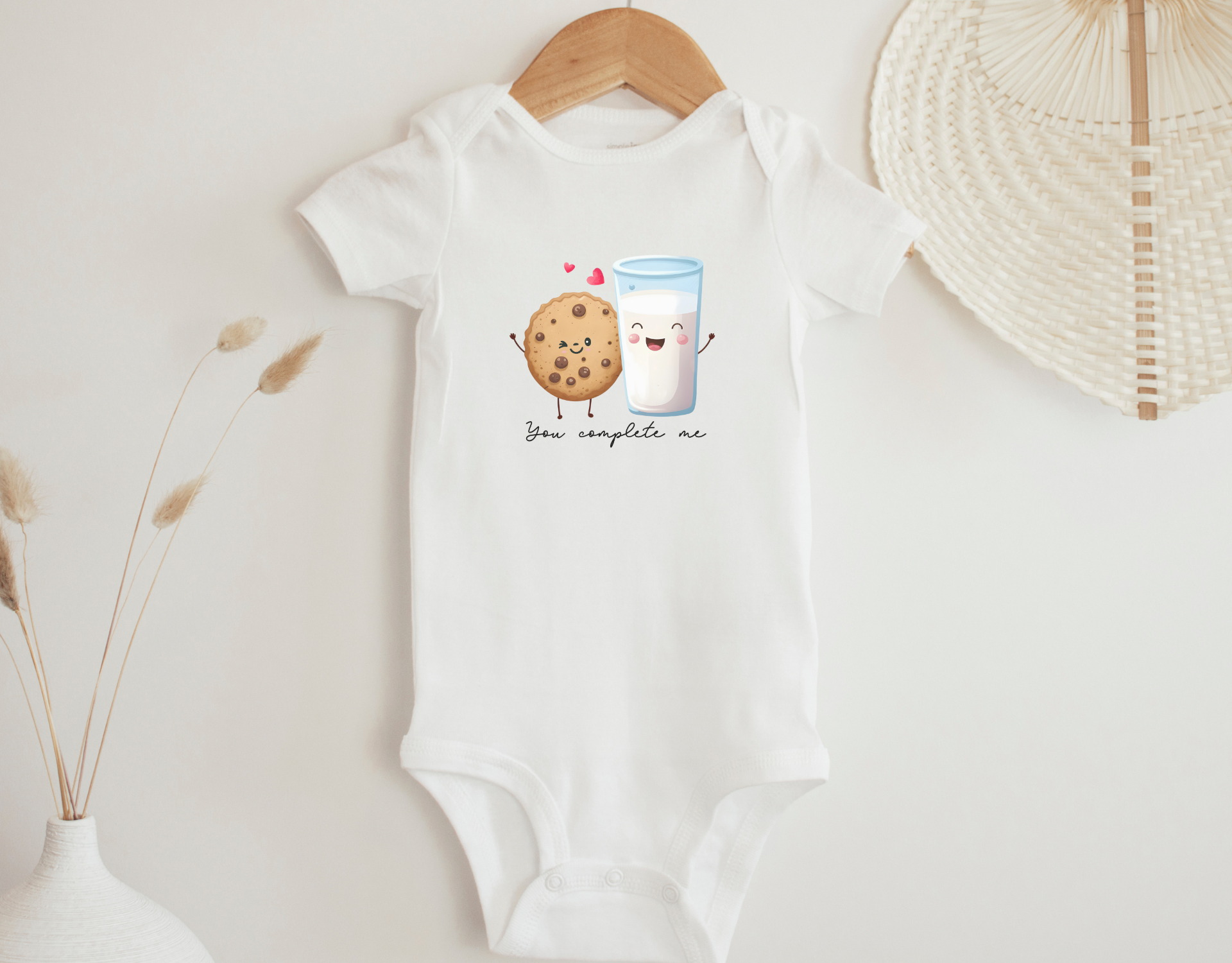 You Complete Me Bodysuit featuring a cute Valentine's Day design on a soft cotton onesie.