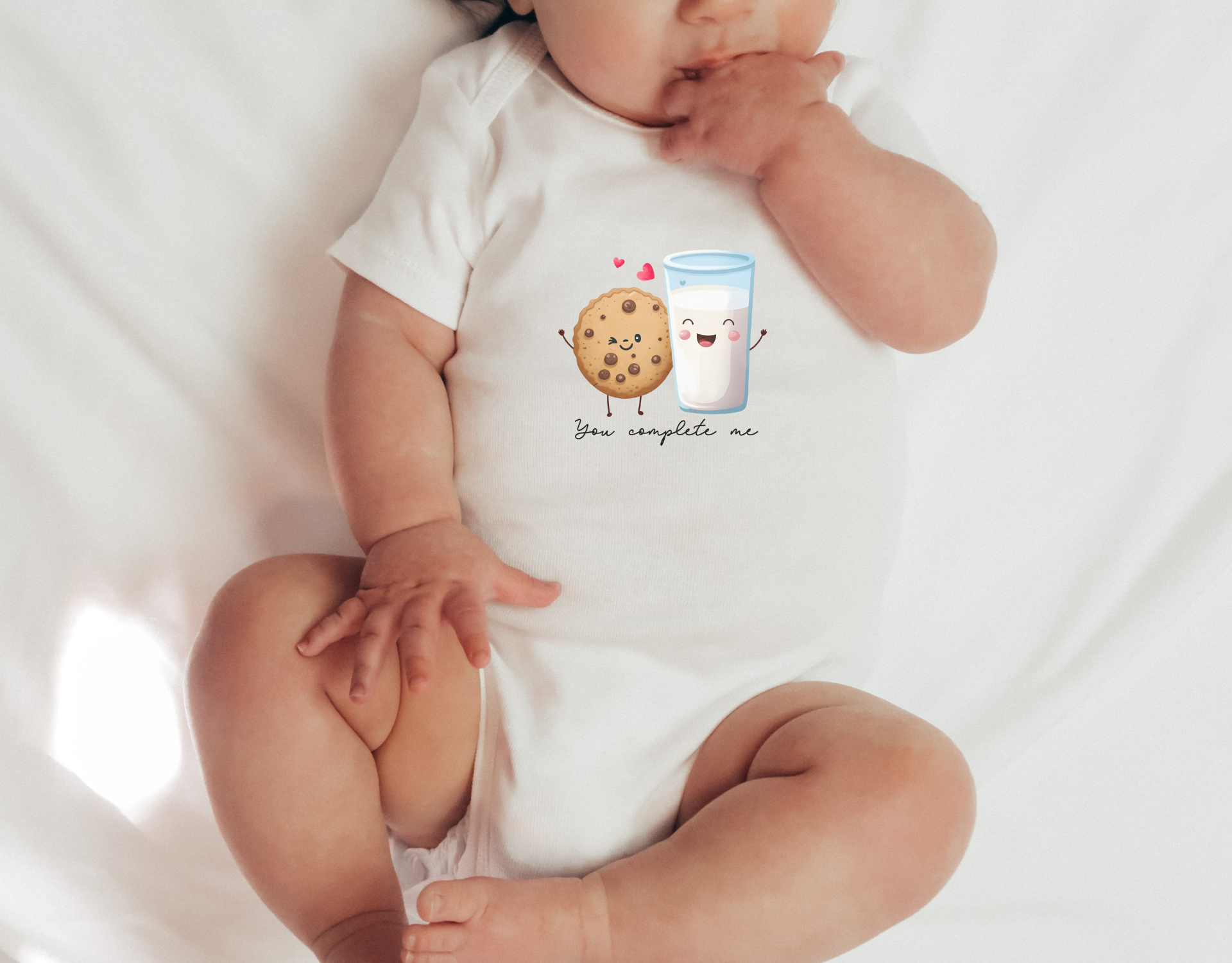 You Complete Me Bodysuit featuring a cute Valentine's Day design on a soft cotton onesie.