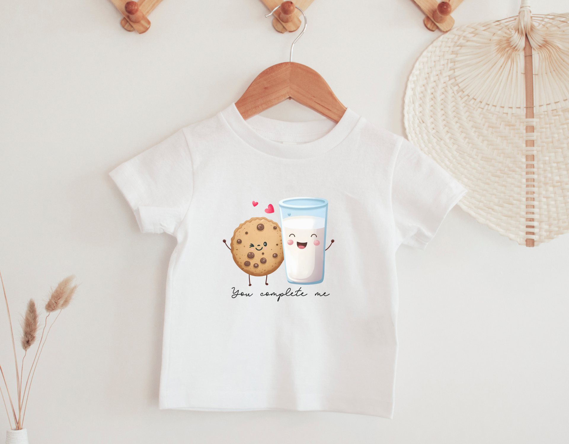 You Complete Me Toddler Shirt featuring a cute design, perfect for Valentine's Day, made with CPSIA compliant materials.