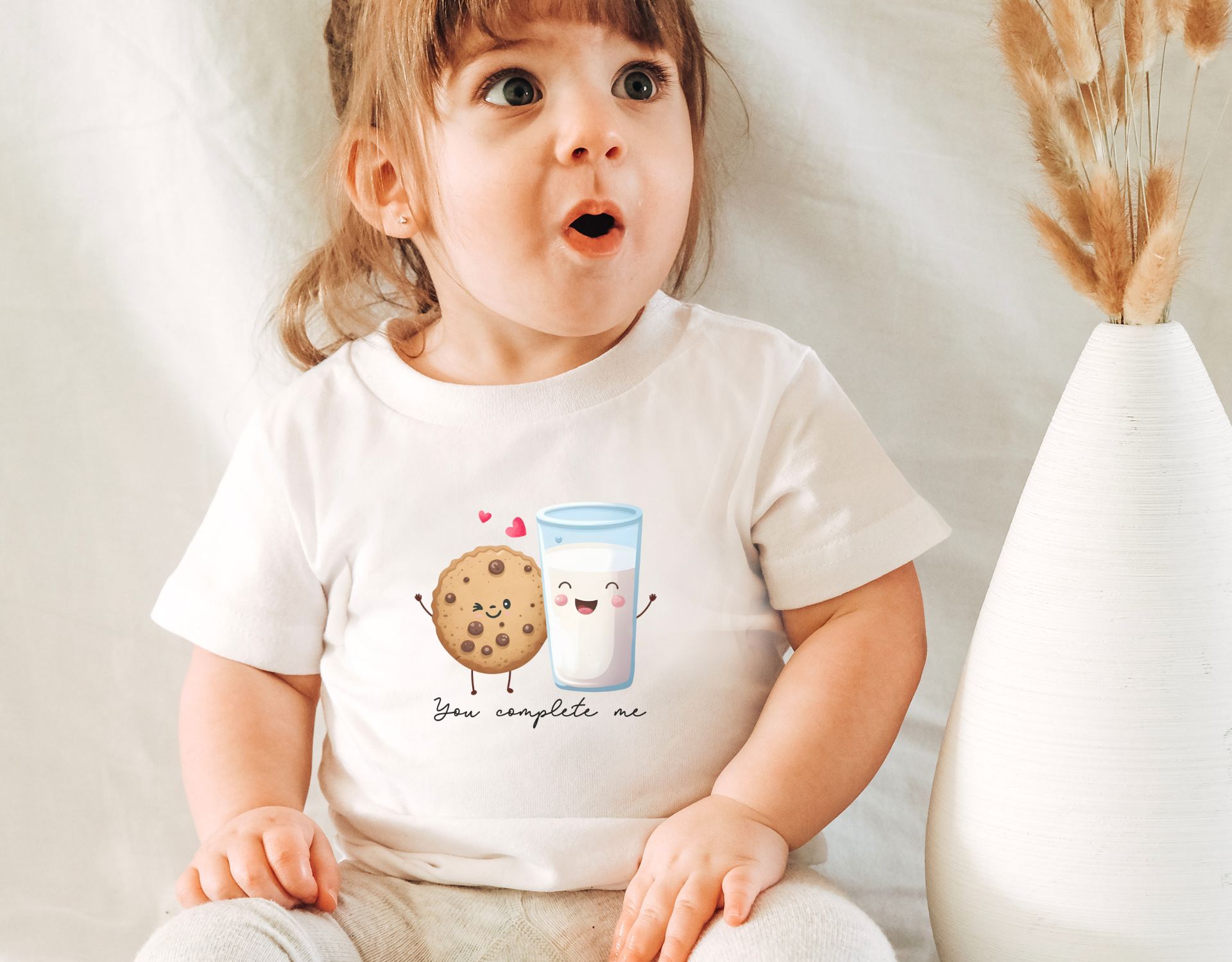 You Complete Me Toddler Shirt featuring a cute design, perfect for Valentine's Day, made with CPSIA compliant materials.