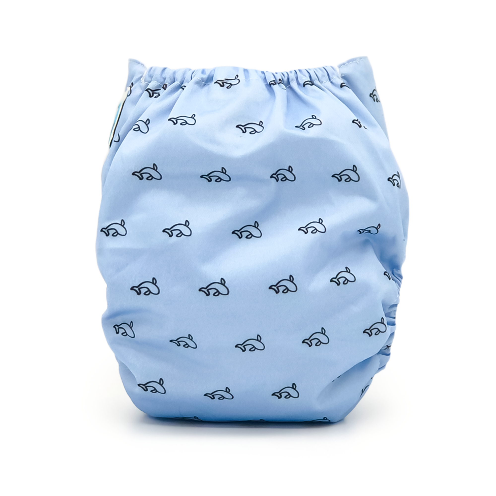 Cetacea Cloth Diaper featuring a sky blue whale print, designed with a waterproof outer layer and a soft microsuede inner layer for comfort.