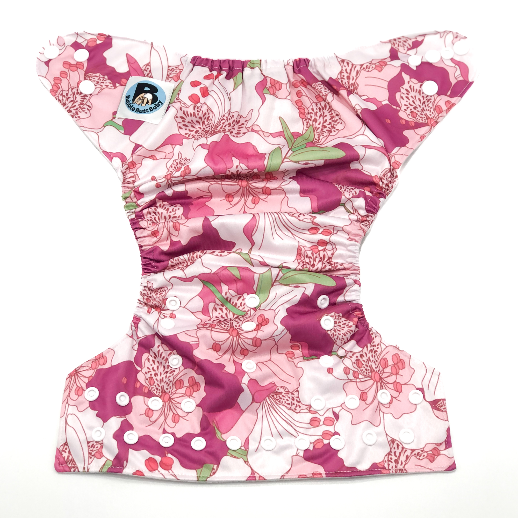 Hibiscus Cloth Diaper featuring vibrant floral design in fuchsias and pale pinks, with a soft microsuede inner layer and adjustable snaps.