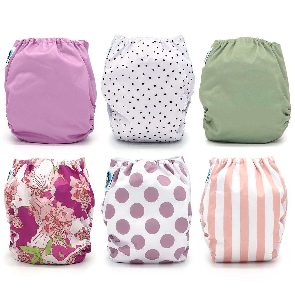 Jolie Fleur Cloth Diaper Collection featuring six stylish pocket diapers in vibrant prints including Hibiscus, Sage, Calathea, Dahlia, Lavender, and Tiger Lily.