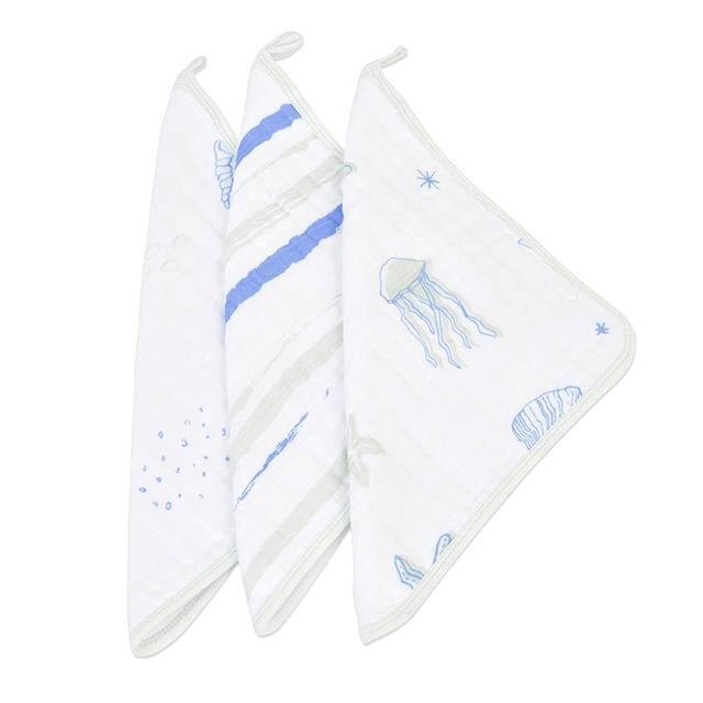 Ocean Cotton Muslin Washcloth Set 3PK featuring colorful prints and attached drying loops, made from 100% plush cotton muslin.