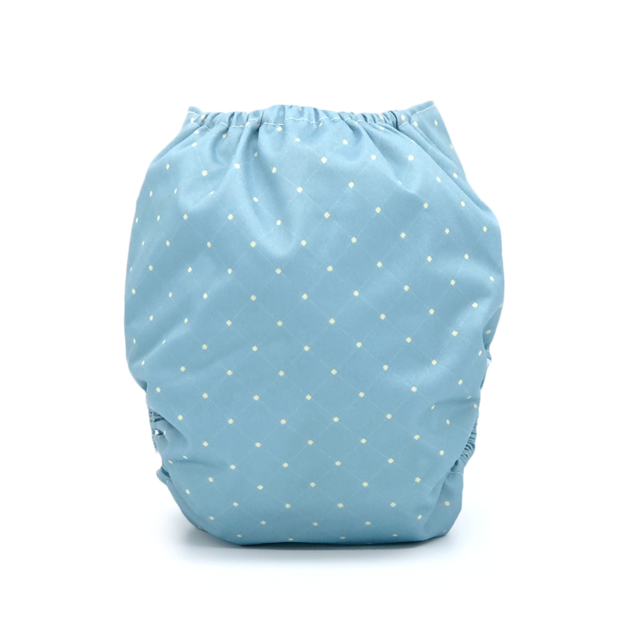 Wellington cloth diaper featuring a denim-inspired design with a subtle quilted pattern, showcasing its stylish and functional features.