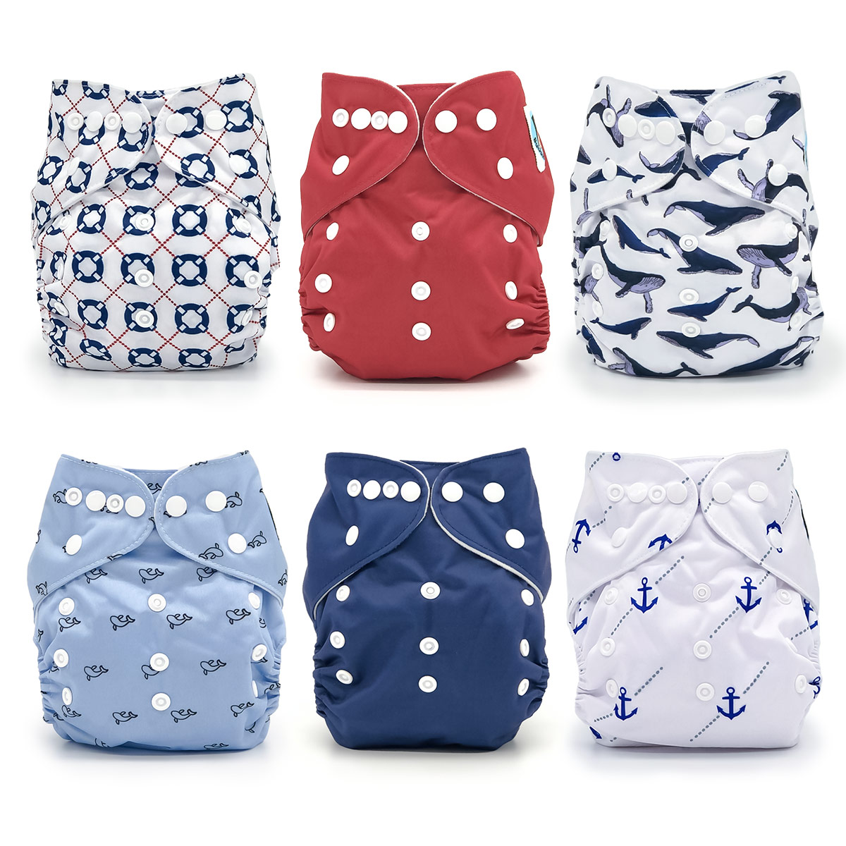 Yachtsman Cloth Diaper Collection featuring six unique prints including Afloat, Gale, Balaena, Cetacea, Adrift, and Ancora with microfiber inserts.