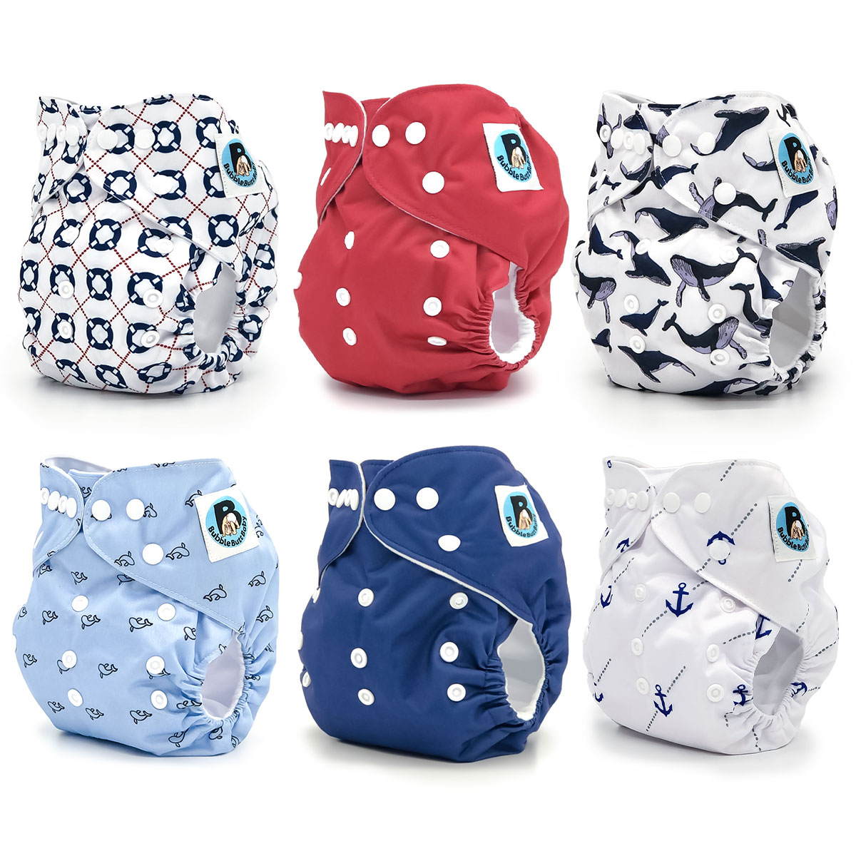 Yachtsman Cloth Diaper Collection featuring six unique prints including Afloat, Gale, Balaena, Cetacea, Adrift, and Ancora with microfiber inserts.