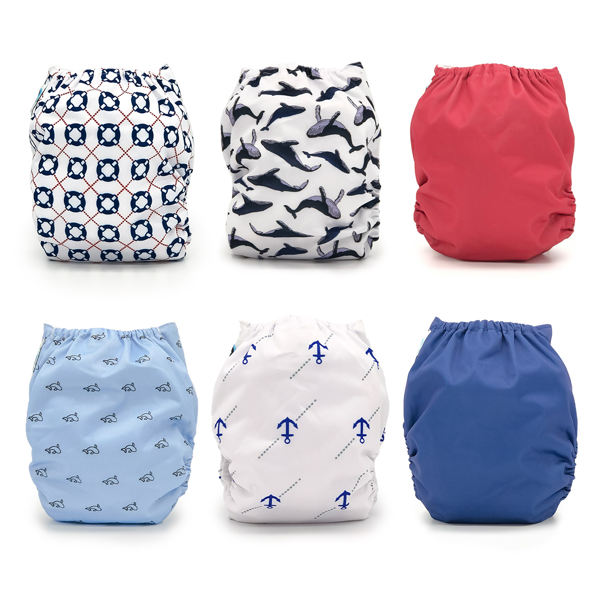 Yachtsman Cloth Diaper Collection featuring six unique prints including Afloat, Gale, Balaena, Cetacea, Adrift, and Ancora with microfiber inserts.