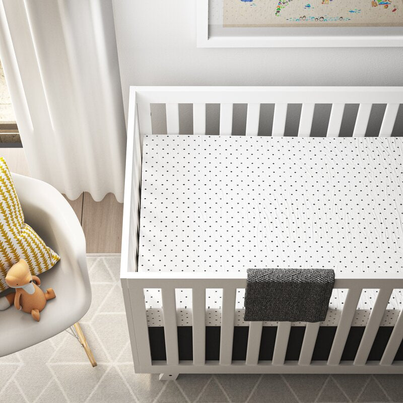 All My Hugs Classic Crib Bedding Set featuring a modern design with a charcoal blanket, fitted sheet, and crib skirt made from 100% organic cotton.