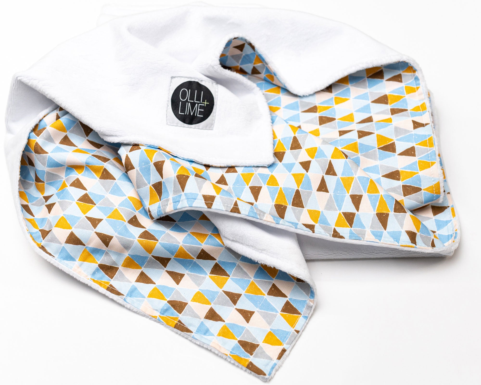 Blue Banners Marching Classic Crib Bedding Set featuring vibrant triangles in blue, brown, gray, and mustard colors, made from premium cotton.