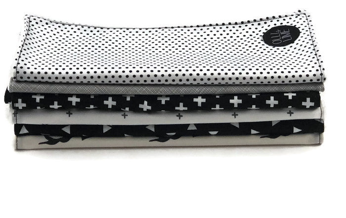 Connect the Dots Lovey security blanket featuring a modern black and white dot design, made from soft minky fabric and cotton percale.