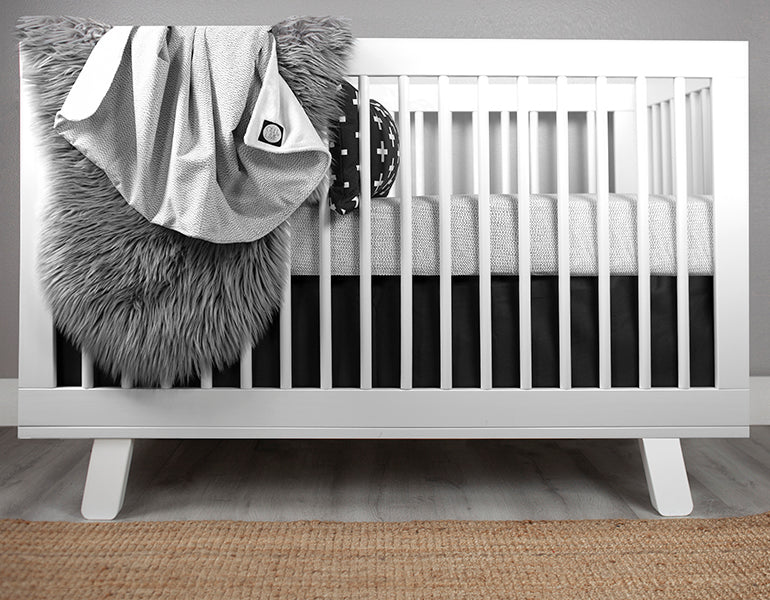 Dashing Classic Crib Bedding Set featuring modern Tiny Dash design in gender-neutral colors, including a crib sheet, plush blanket, and crib skirt.