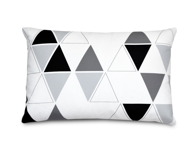 Flippy Triangles Accent Pillow featuring a modern triangle pattern in vibrant colors on a linen blend fabric.