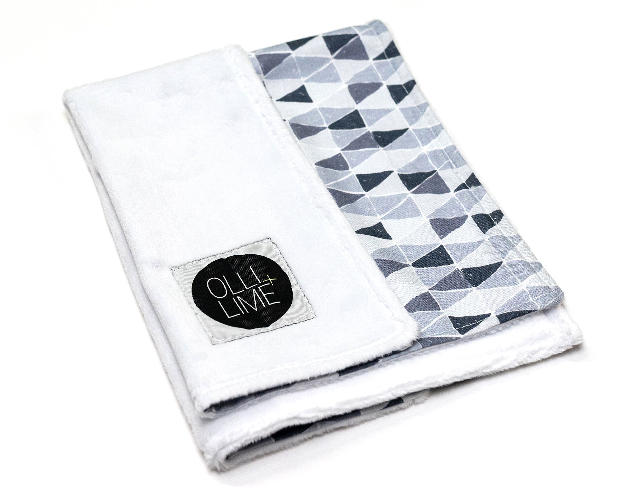 Gray Banners Marching Deluxe Crib Bedding Set featuring modern gray triangle patterns and soft cotton materials.