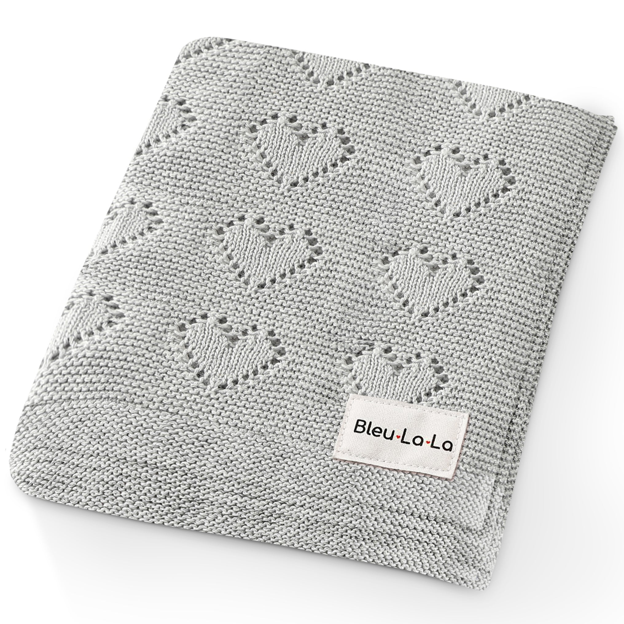 Heart Knit Baby Blanket made from 100% soft natural cotton, featuring a timeless heart theme design in gender-neutral colors, perfect for newborns.