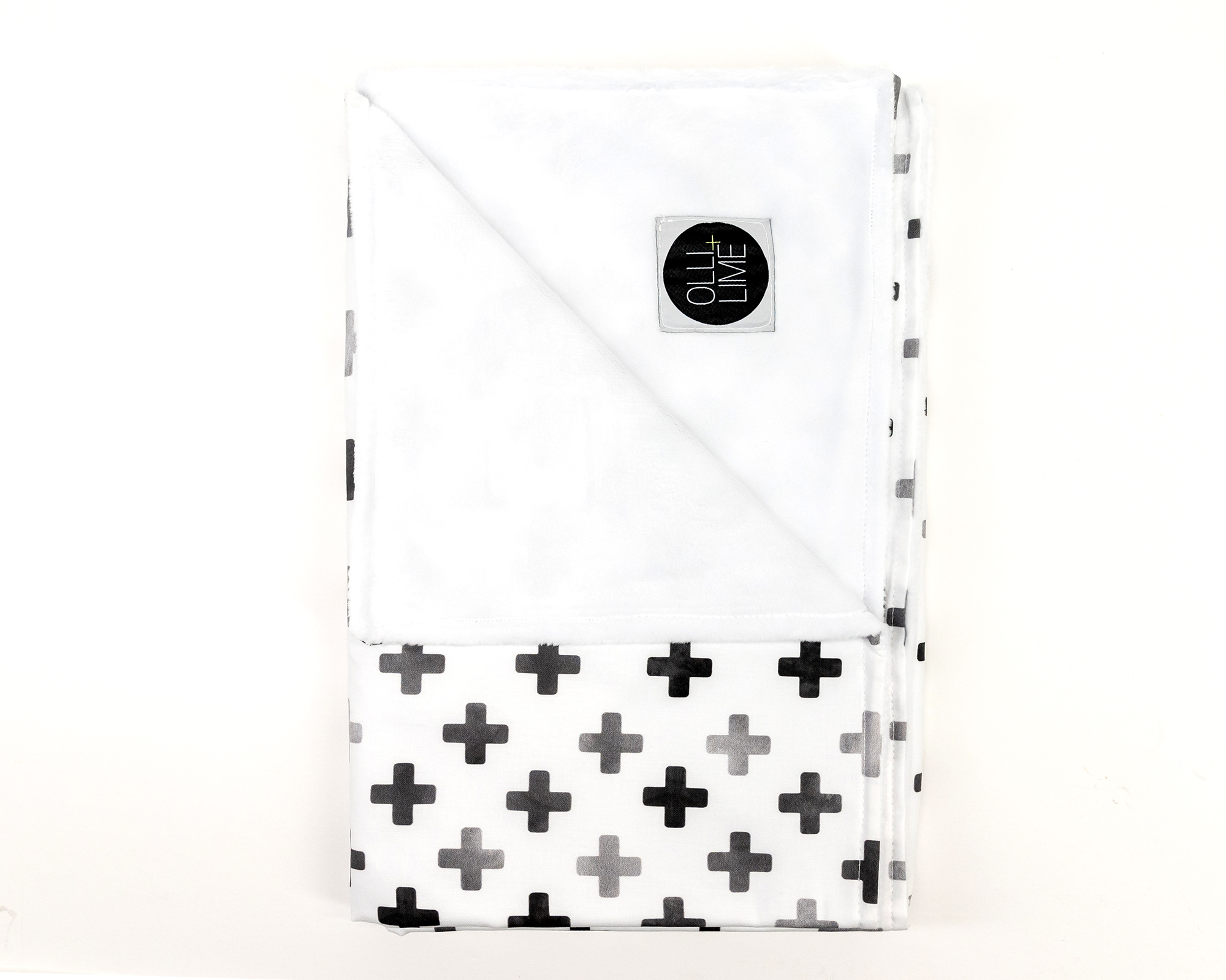 Hugo's Hazy Cross Baby Blanket featuring gray Swiss crosses on white, soft cotton fabric.