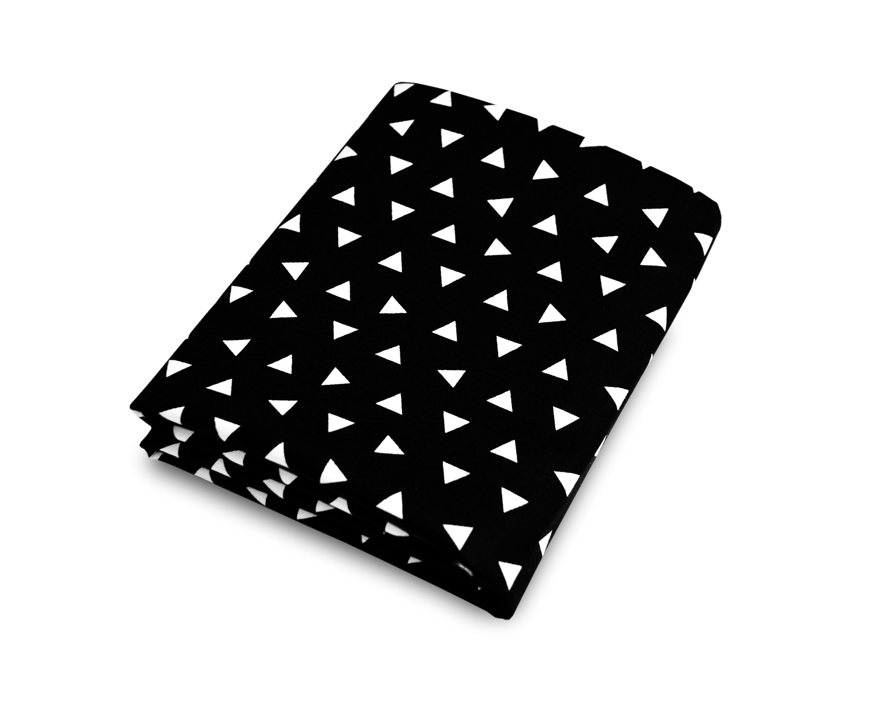 Kingsley Deluxe Crib Bedding Set featuring modern triangle designs in black and white with a grey weave blanket, perfect for stylish nurseries.