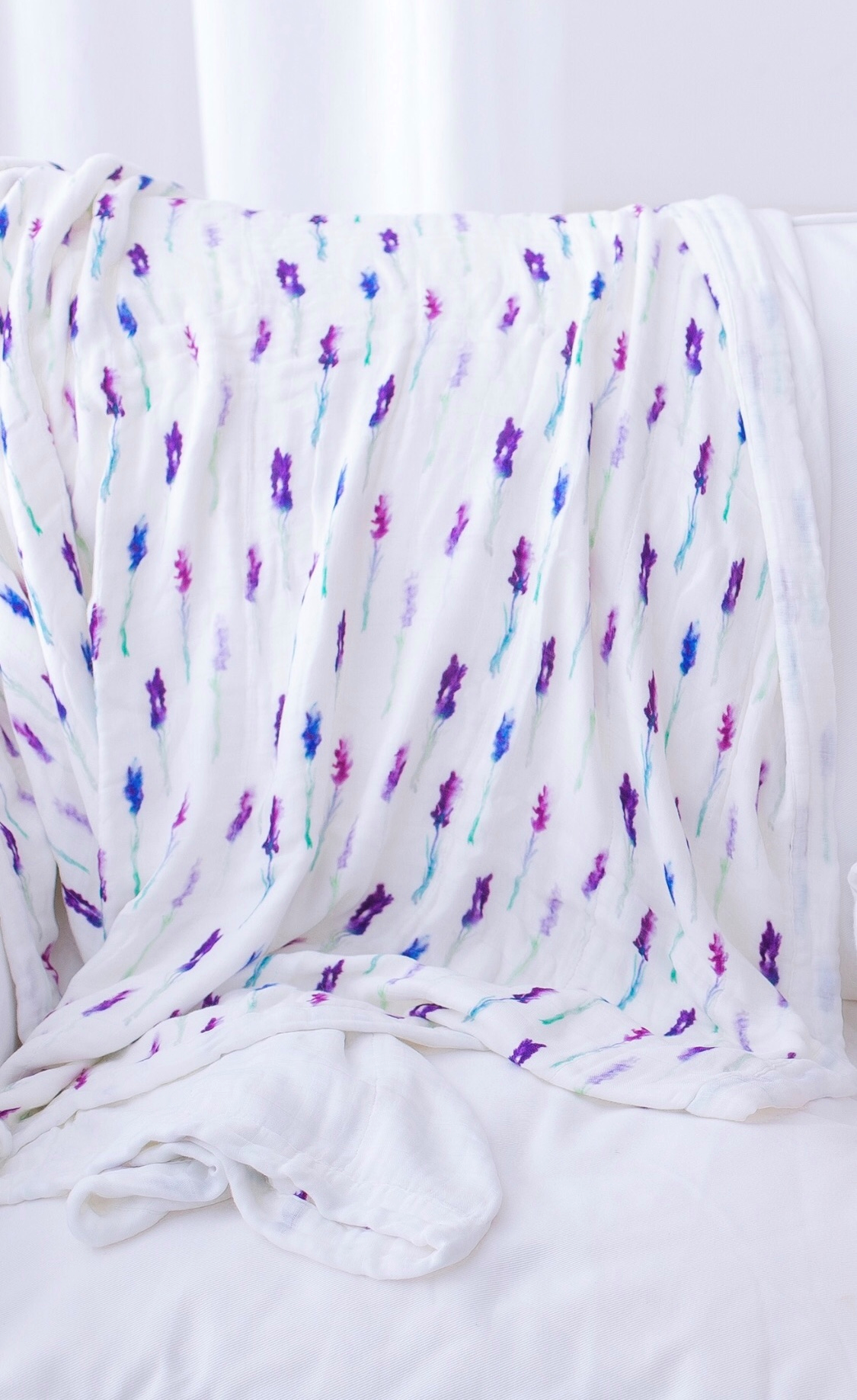 Lavender and White Newcastle Blanket made of soft bamboo muslin, featuring a cozy four-layer design perfect for kids.