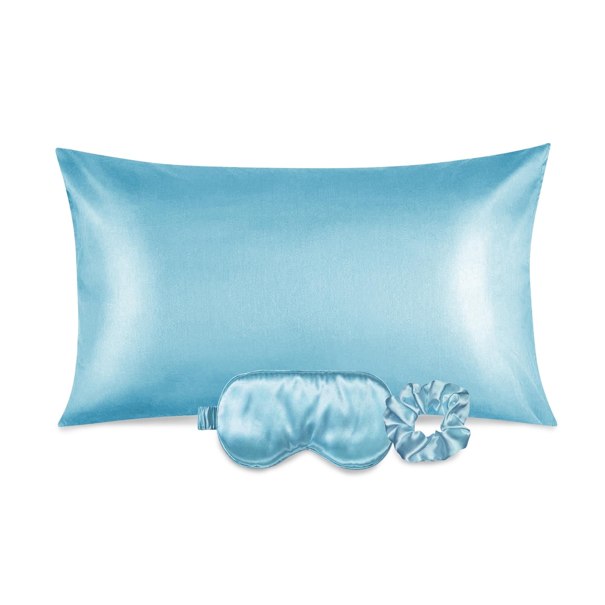 Luxurious satin pillowcase, eye mask, and scrunchie set in soft fabric, ideal for hair and skin care.