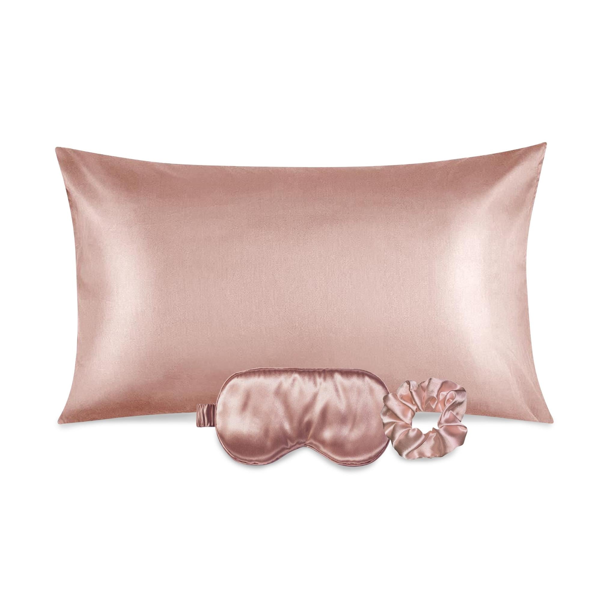 Luxurious satin pillowcase, eye mask, and scrunchie set in soft fabric, ideal for hair and skin care.