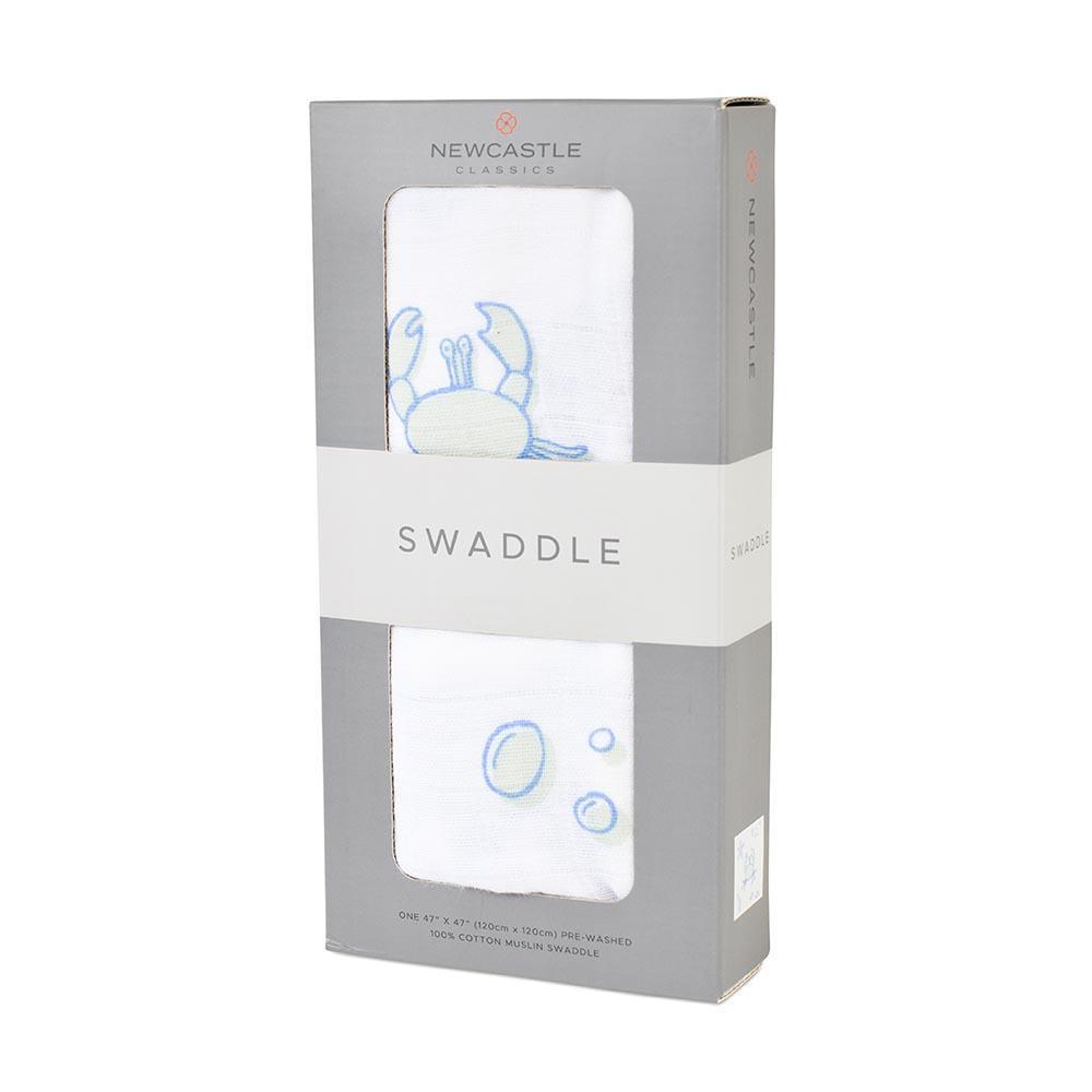 Ocean Swaddle made from 100% natural cotton muslin, featuring a soft and breathable design in a calming ocean-themed pattern.