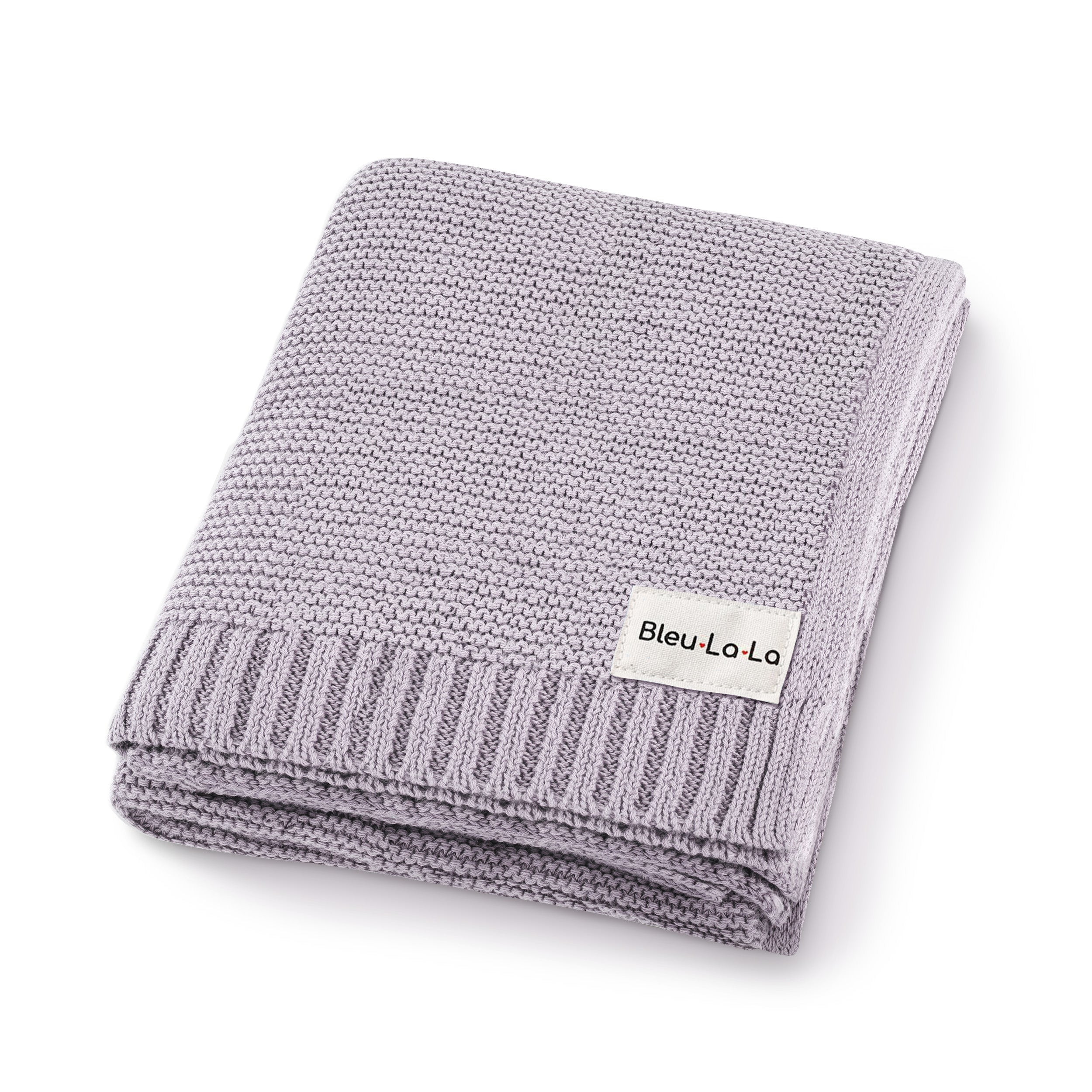 Organic Cotton Luxury Knit Baby Swaddle Blanket in soft pastel colors, showcasing its gentle texture and versatile design for newborns and toddlers.