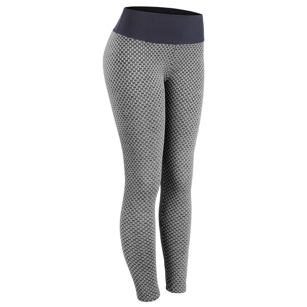 A pair of women's ankle-length push up bubble butt leggings in black, made from stretchy polyester and spandex, designed for a flattering fit.