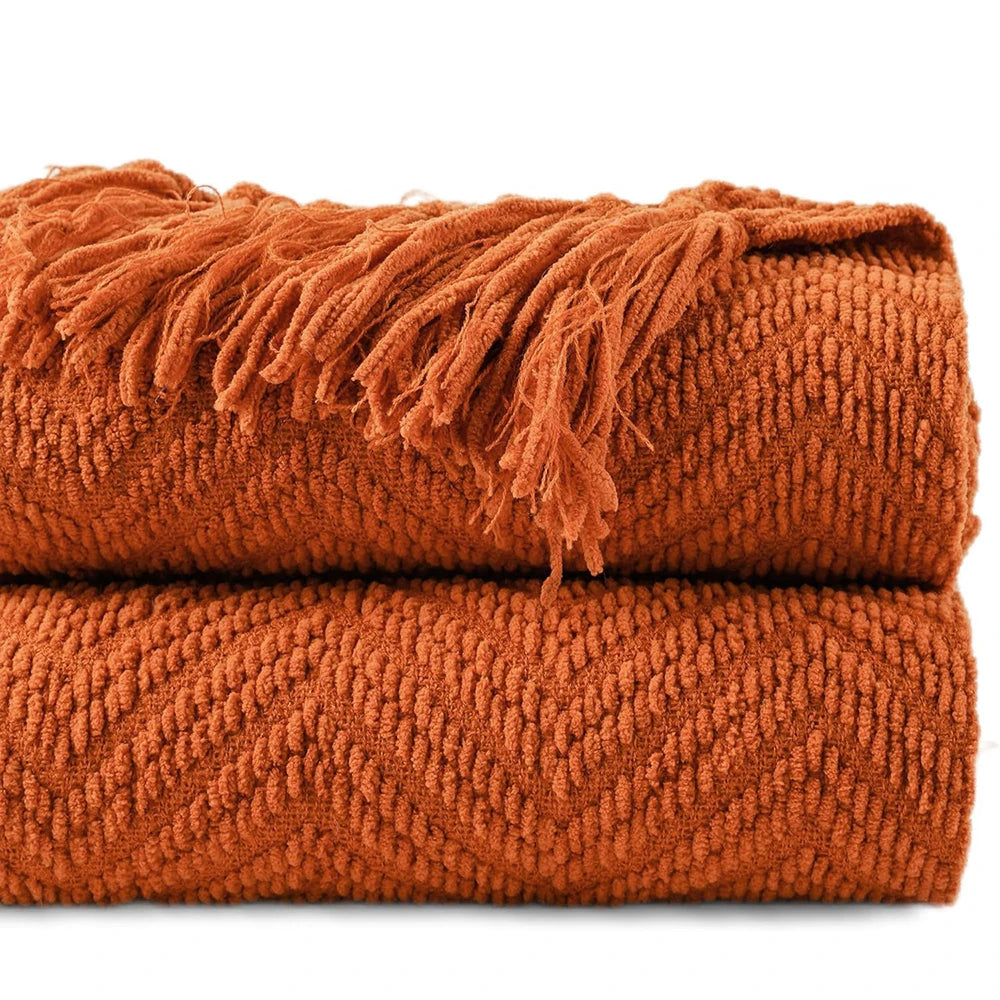 Ziz-Zag Chielina Knitted Throw Blanket in rich color, showcasing its elegant texture and soft chenille material, perfect for cozying up on a sofa or bed.