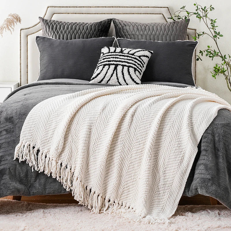 Ziz-Zag Chielina Knitted Throw Blanket in rich color, showcasing its elegant texture and soft chenille material, perfect for cozying up on a sofa or bed.