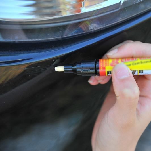 AutoPro Scratch Magic Eraser pen designed for removing car scratches, featuring a sleek design and easy-to-use applicator tip.