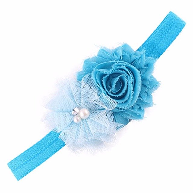 Blue floral headband with pearls.