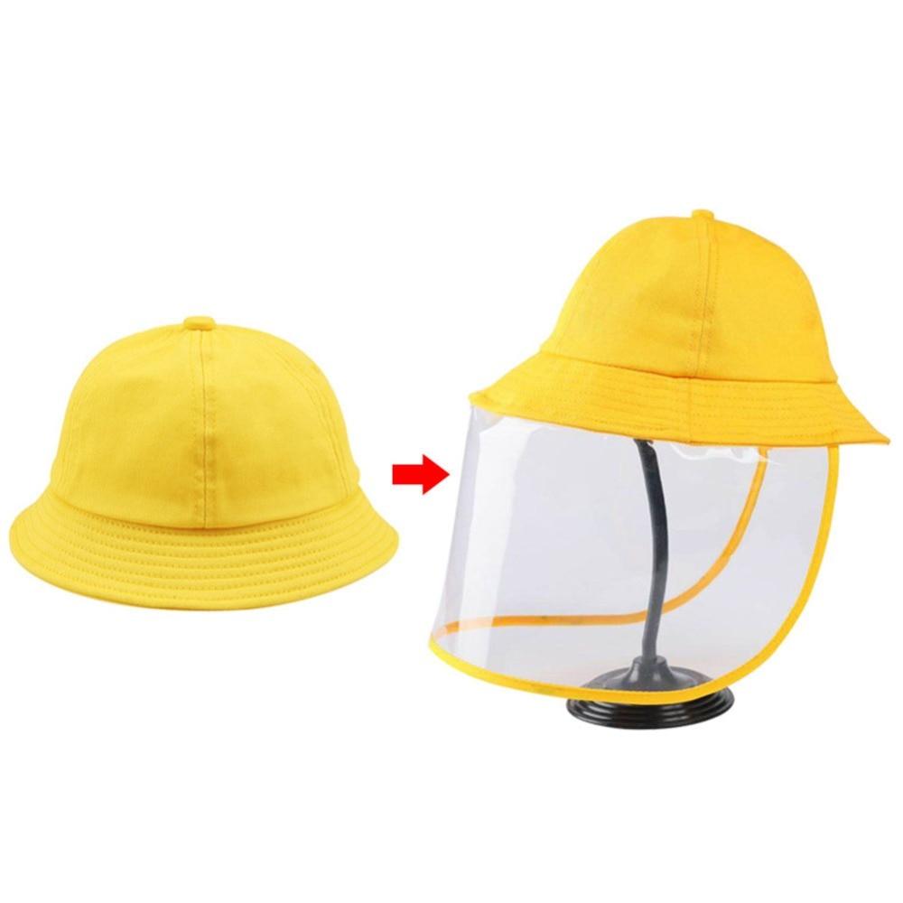 Children's bucket hat featuring a detachable transparent front panel for protection against dust and droplets, made from soft cotton and plastic.