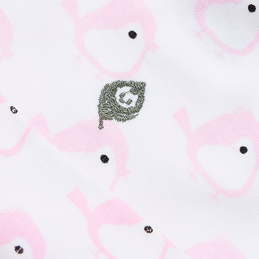 The Pink Birdie Hat made from 100% organic cotton, featuring a Baby-in-Leaf embroidery and vibrant water-based ink print, perfect for babies.