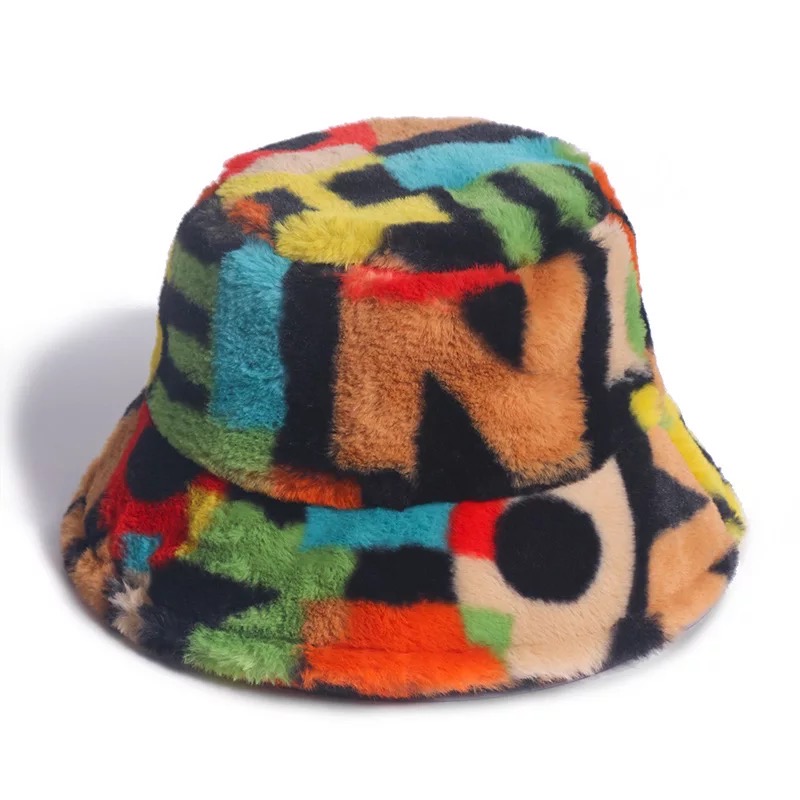 A stylish Vintage CHIC Jazzy Bucket Hat made of soft faux fur, featuring an adjustable inner knot for a perfect fit, ideal for women's fashion.