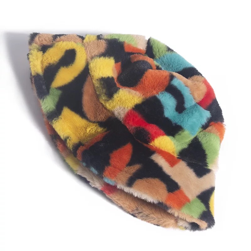 A stylish Vintage CHIC Jazzy Bucket Hat made of soft faux fur, featuring an adjustable inner knot for a perfect fit, ideal for women's fashion.