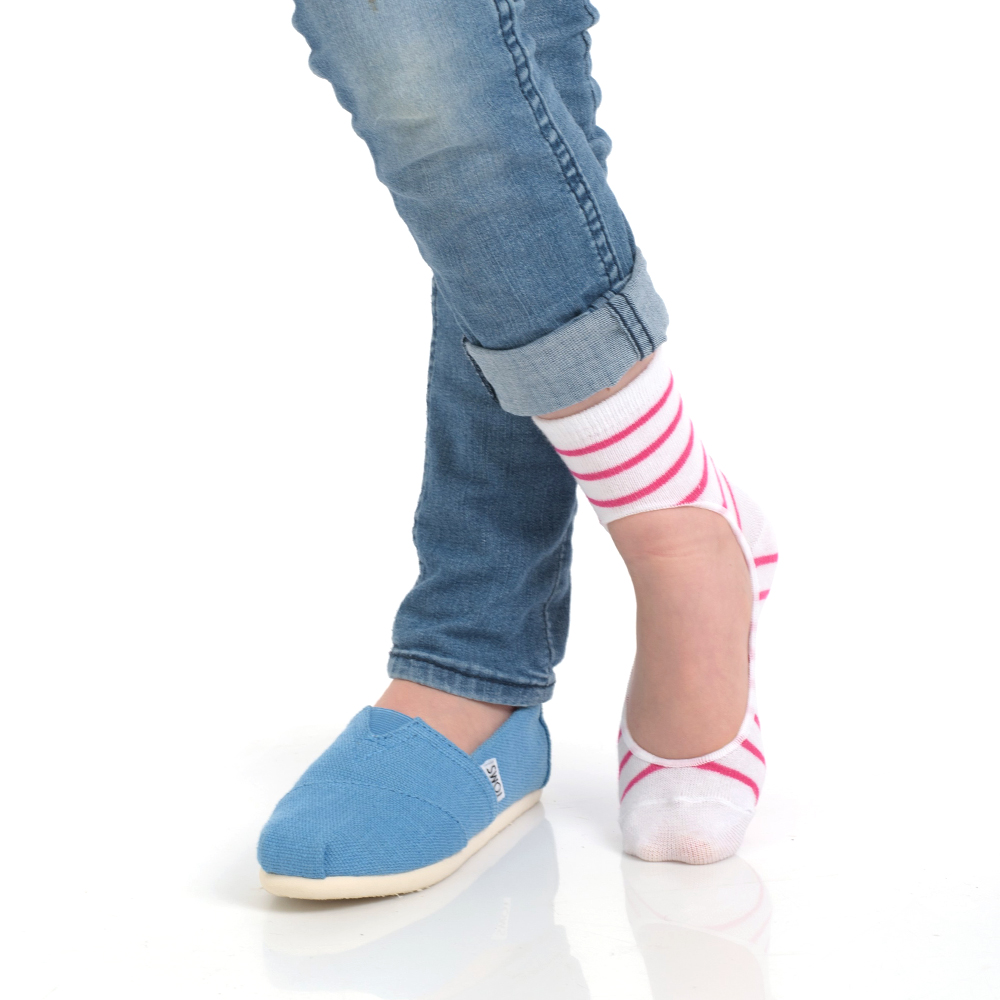 A pair of BabyKeys no-slip socks for babies, featuring a keyhole opening design, made from soft cotton blend material, available in various sizes.