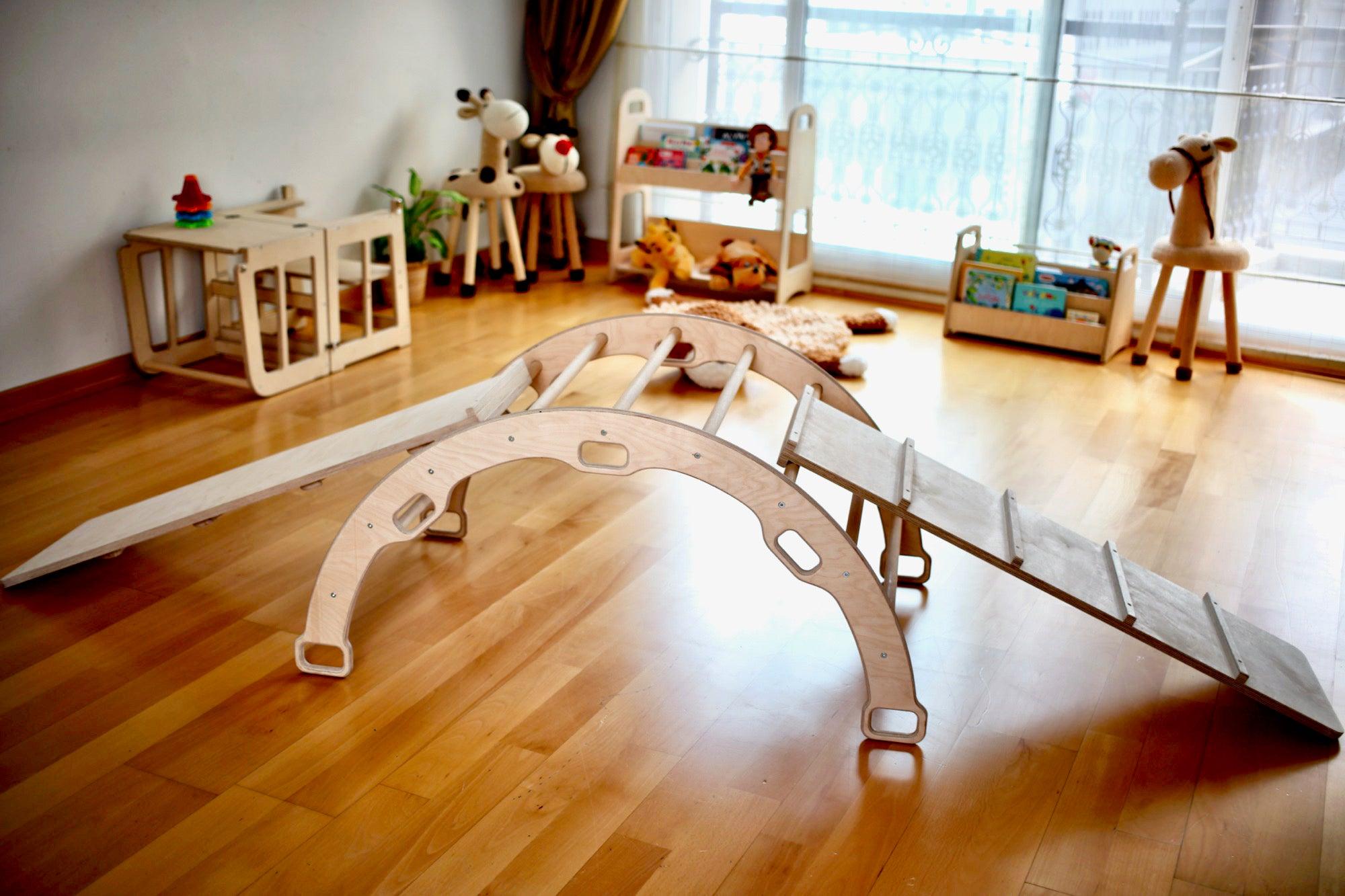 4 Pieces Montessori Climbing Set featuring a climbing triangle, arch/rocker, ladder, and sliding ramps made from natural birch plywood.