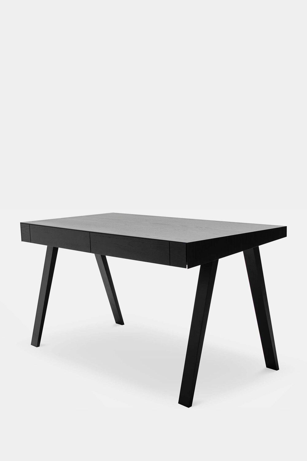 The 4.9 Desk by Marius Valaitis featuring a unique design with a storage slit and smooth surface, showcasing modern elegance and functionality.